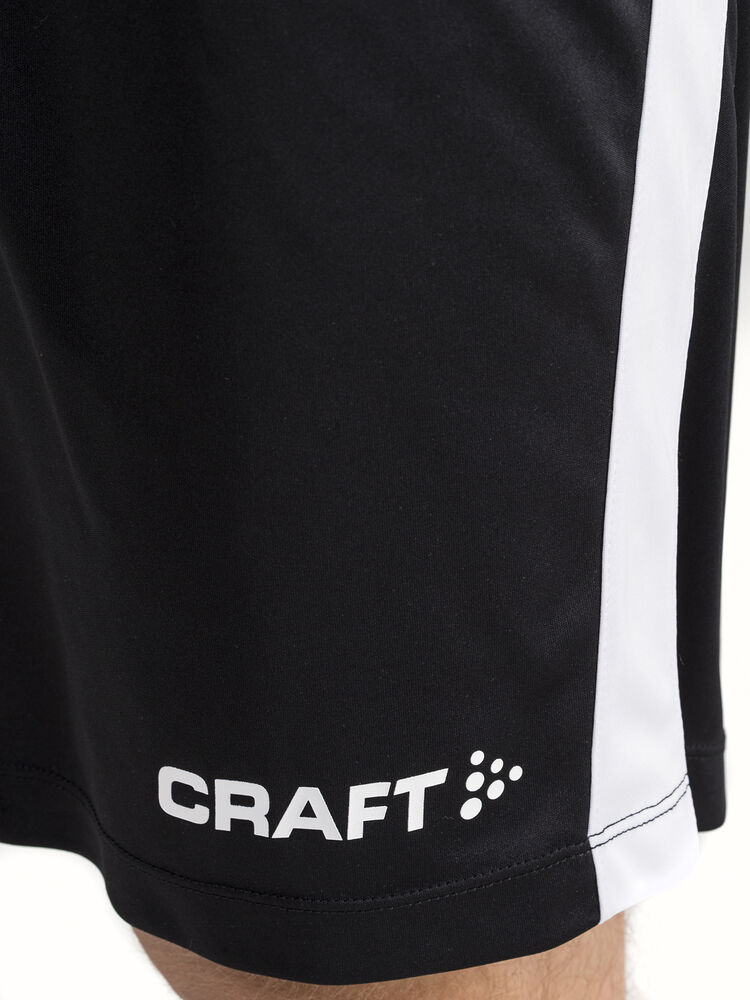 Craft Progress Longer Shorts Contrast M - Black/White AW25 [999900] / XS