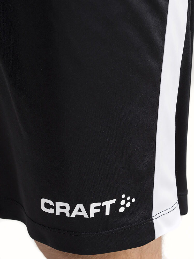 Craft Progress Longer Shorts Contrast M - Black/White AW25 [999900] / XS