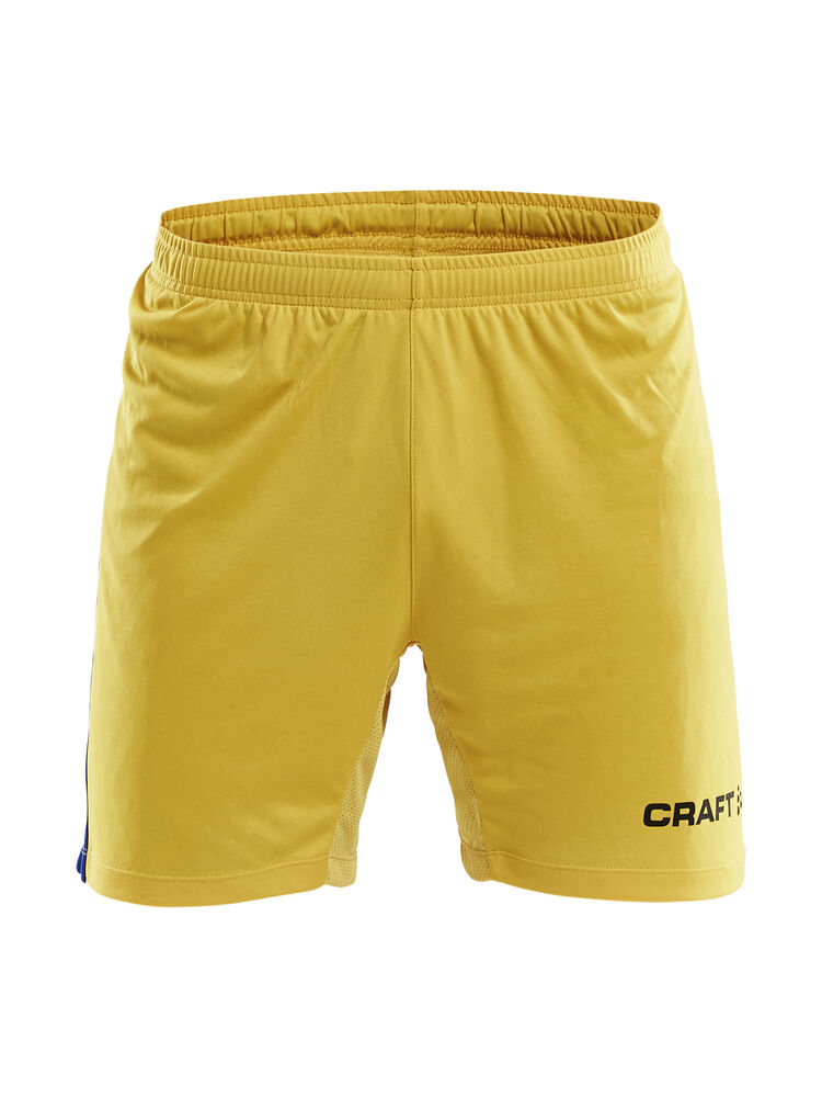 Progress Short Contrast M från Craft i Sweden yellow/Club cobolt