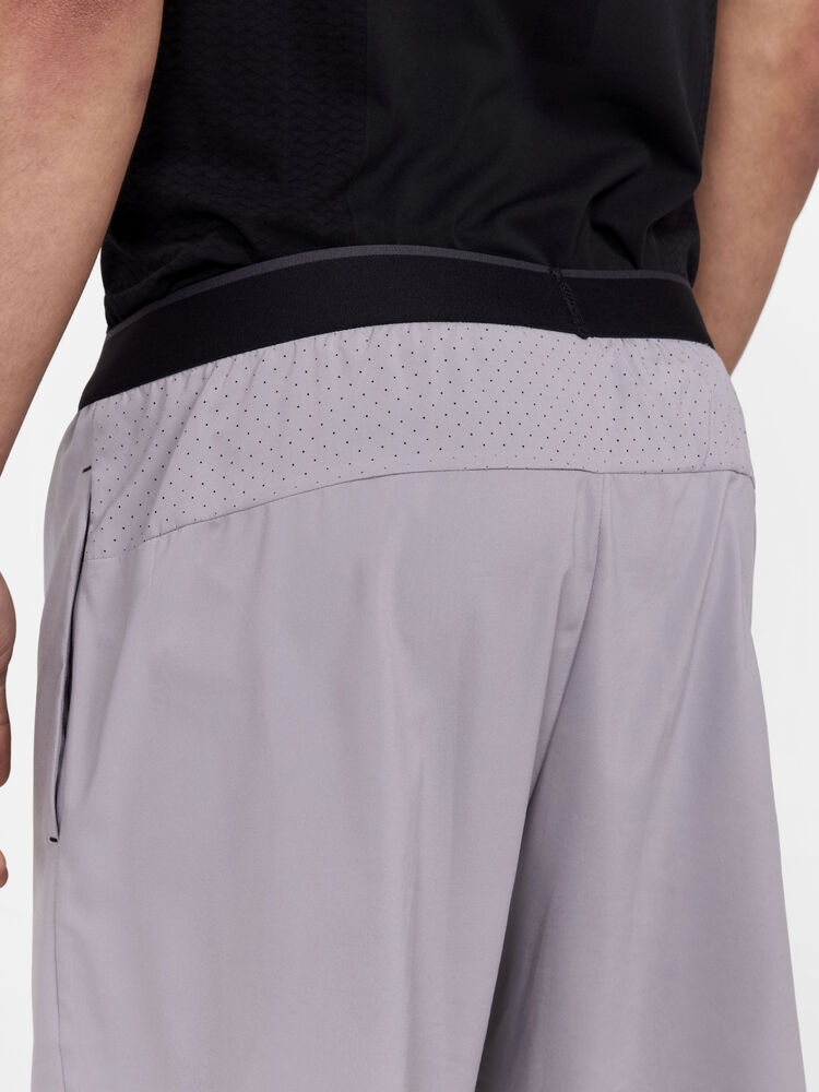 Craft ADV Essence Perforated 2-in-1 Stretch Shorts M - Rock [954000] / XS