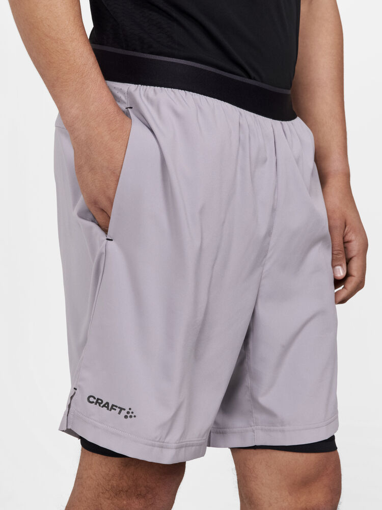 Craft ADV Essence Perforated 2-in-1 Stretch Shorts M - Rock [954000] / XS