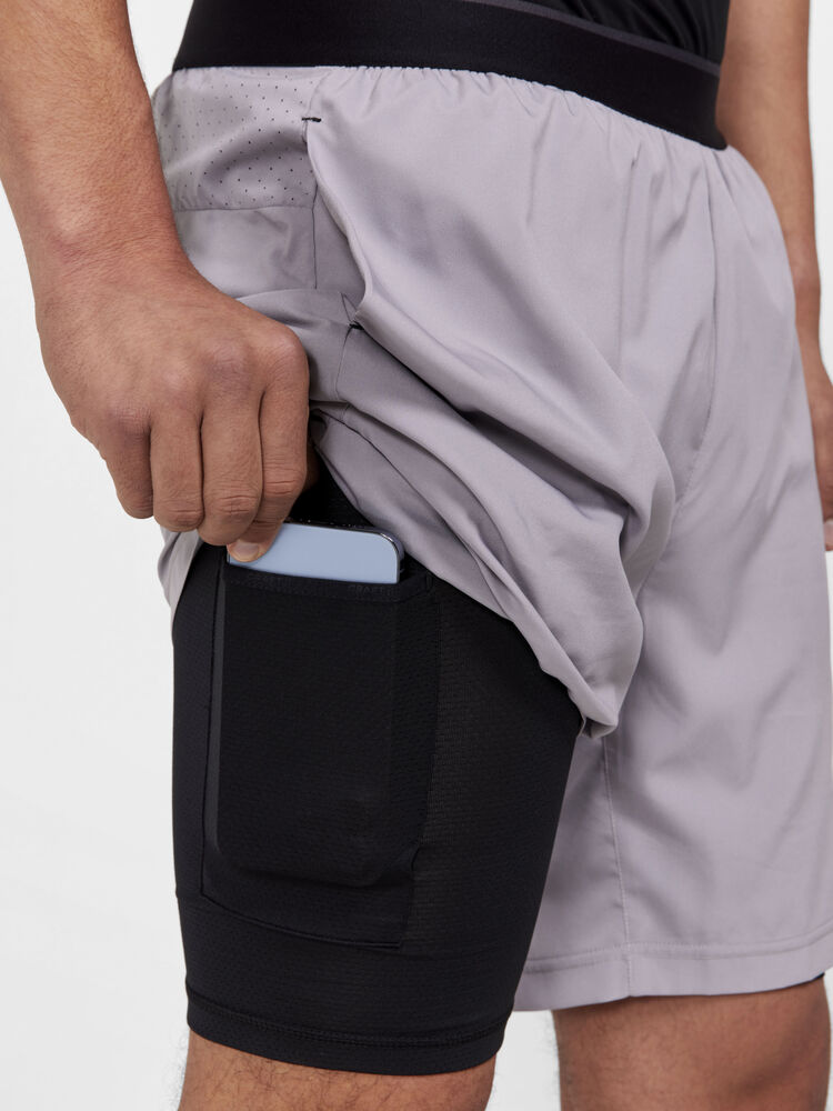 Craft ADV Essence Perforated 2-in-1 Stretch Shorts M - Rock [954000] / XS