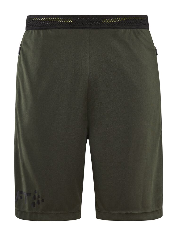 Evolve Zip Pocket Shorts M från Craft i Juniper-logo