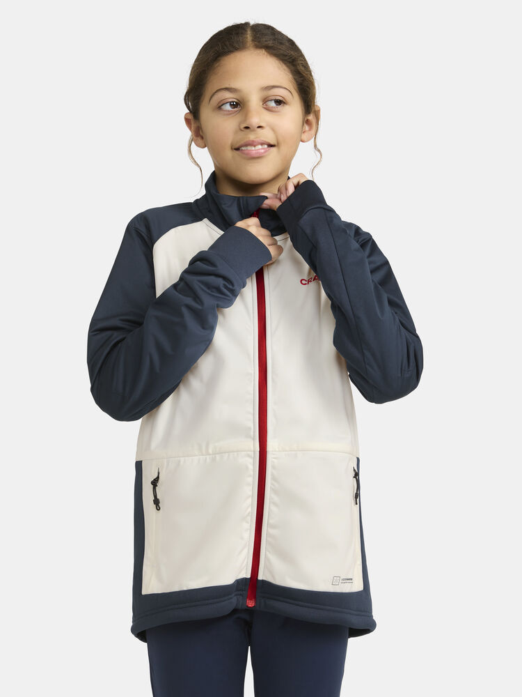 Core Warm XC Jacket Jr från Craft i Blaze/Tofu