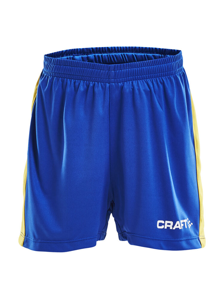 Progress Short Contrast Jr Wb från Craft i Royal blue/Sweden yellow