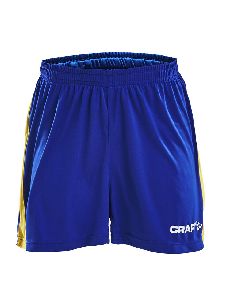 Progress Short Contrast Jr Wb från Craft i Club cobolt/Sweden yellow