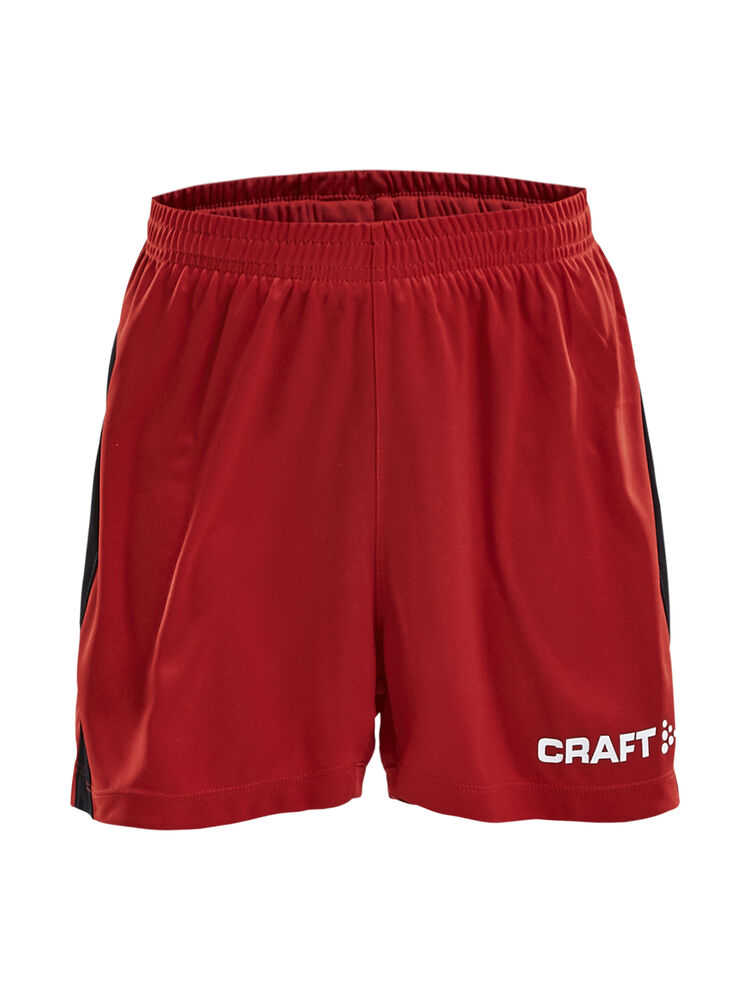 Progress Short Contrast Jr Wb från Craft i Bright red/Svart